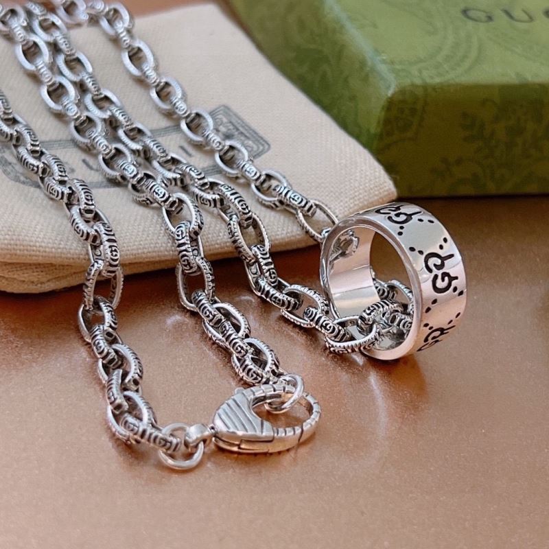 G*u*i necklaces